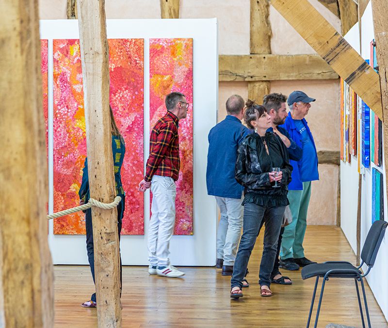 Vistors to The Rodd enjoying an exhibition of Aboriginal Art