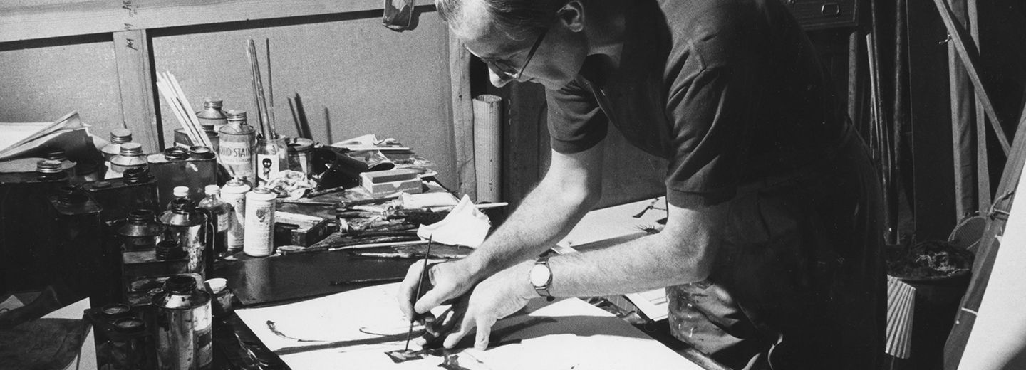 Sidney Nolan painting in his studio